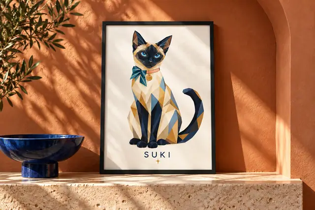 Black-framed geometric Siamese portrait in a terracotta arch above a stone ledge and blue bowl